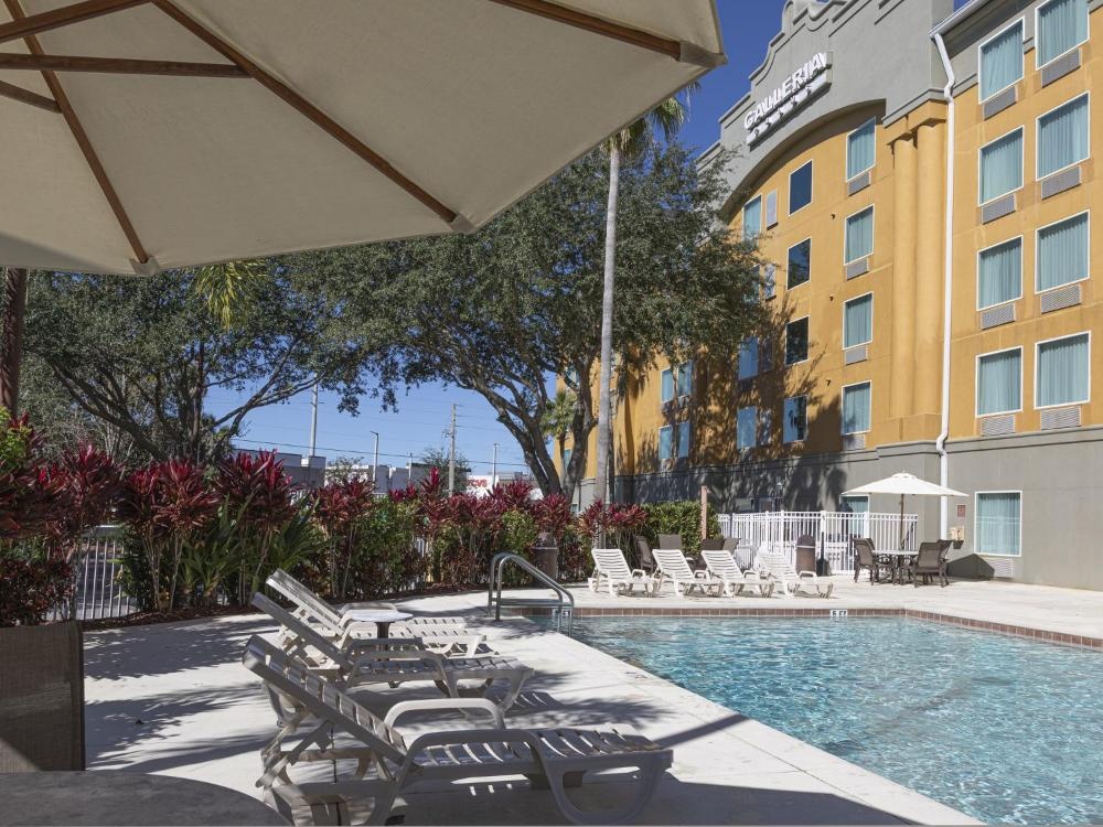 Galleria Palms Hotel Pool Deck Sun Loungers Umbrellas