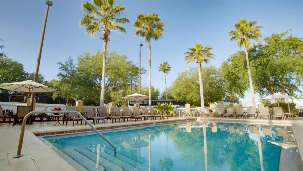 The Galleria Palms Resort-Style Pool Chaise Lounges Poolside Umbrellas